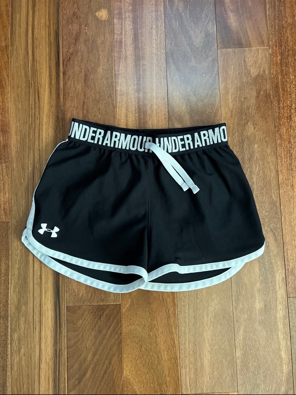 Under Armour Black Athletic Shorts with White Trim and Branded Waistband
